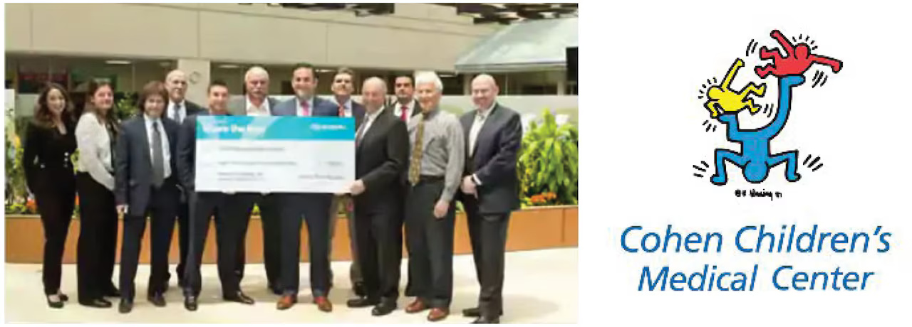 Grand Prix Subaru team presenting donation check to Cohen Children's Medical Center